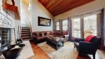 2 Bedroom  loft features a spacious living area and high vaulted ceilings and a wood-burning fireplace